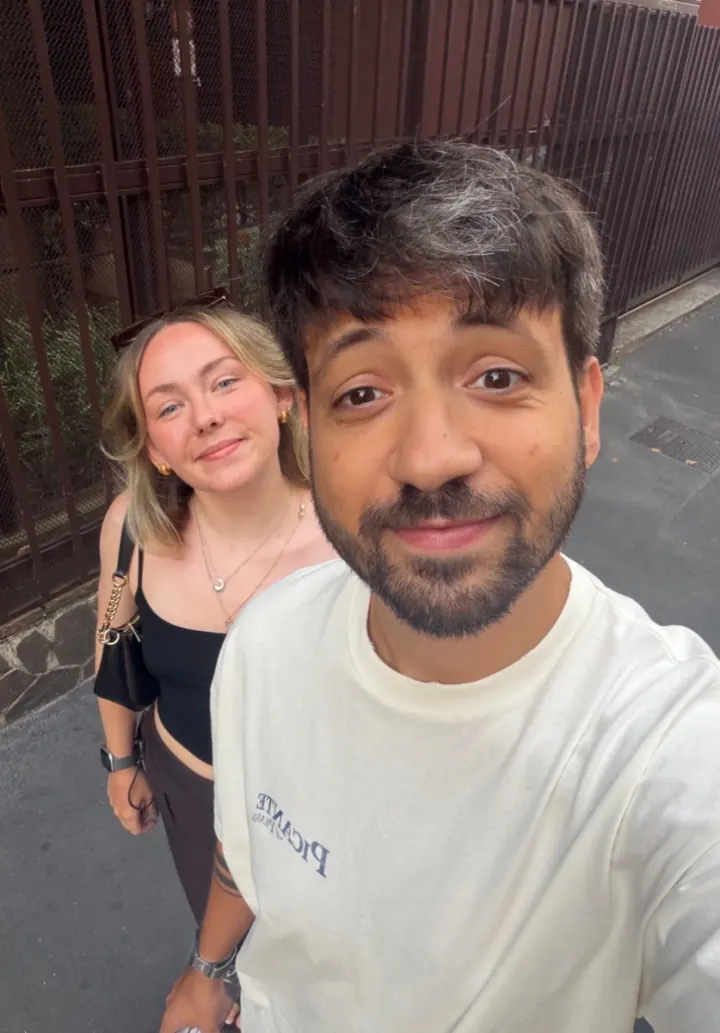 Chloe and Pol taking a selfie outdoors
